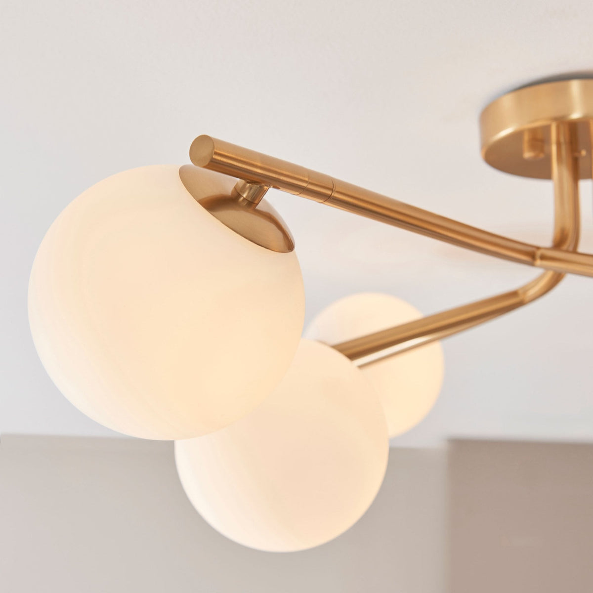 Aaron Six Lamp Semi Flush Ceiling Light in Brushed Aged Brass & Matt Opal Duplex Glass Spheres