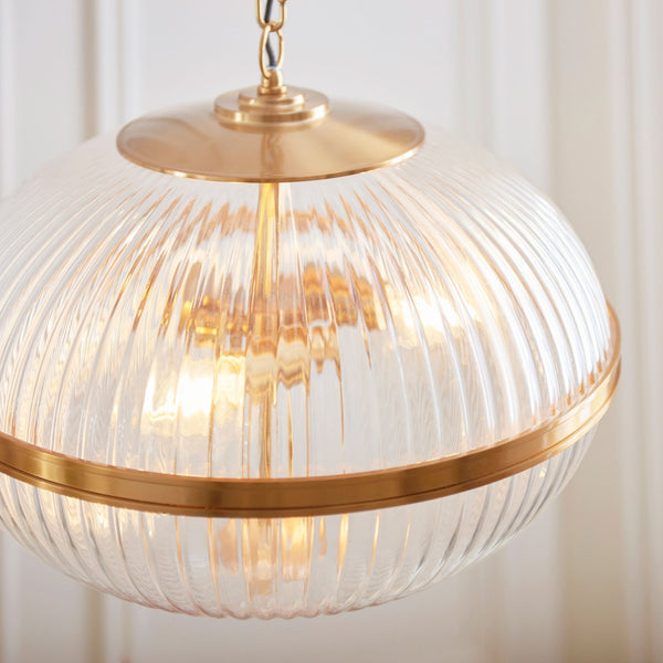 Somerset Three Light Pendant in Vintage Brass & Clear Ribbed Glass Shade