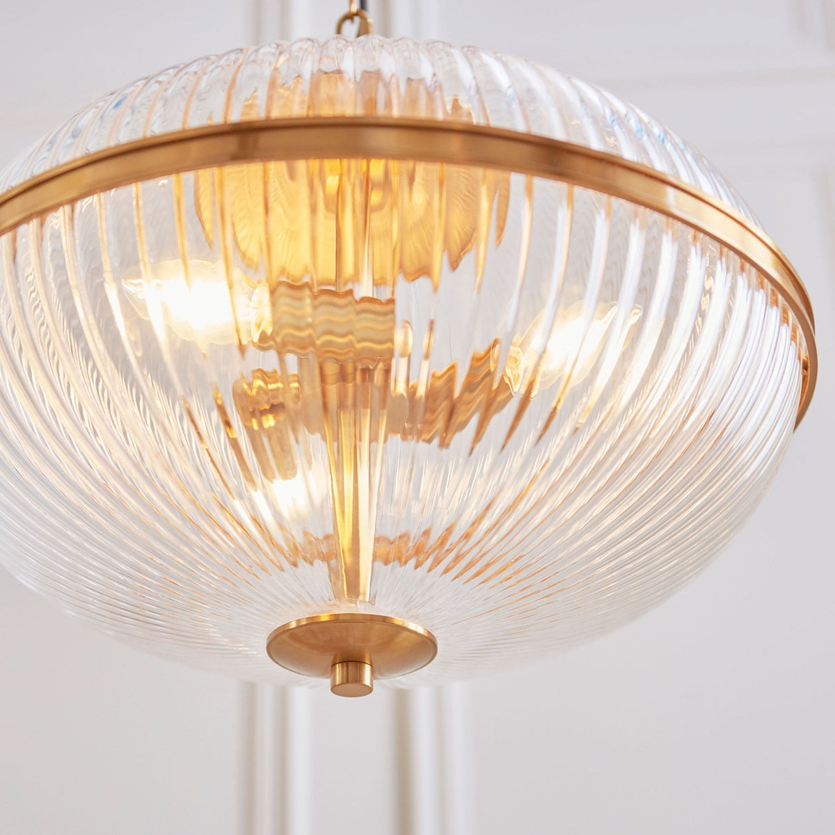 Somerset Three Light Pendant in Vintage Brass & Clear Ribbed Glass Shade