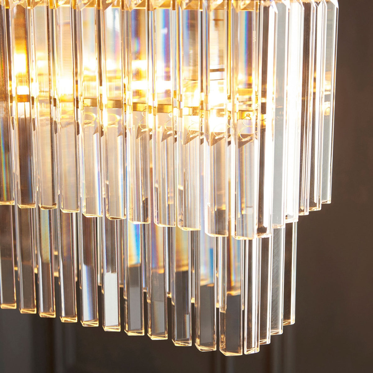 Conaston Four Light Two Tier Linear Pendant in Brushed Aged Brass & Clear Cut Lozenge Glass Drops