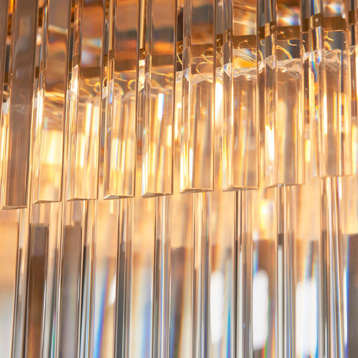 Conaston Four Light Two Tier Linear Pendant in Brushed Aged Brass & Clear Cut Lozenge Glass Drops