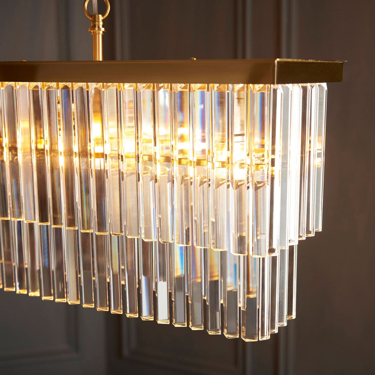 Conaston Four Light Two Tier Linear Pendant in Brushed Aged Brass & Clear Cut Lozenge Glass Drops