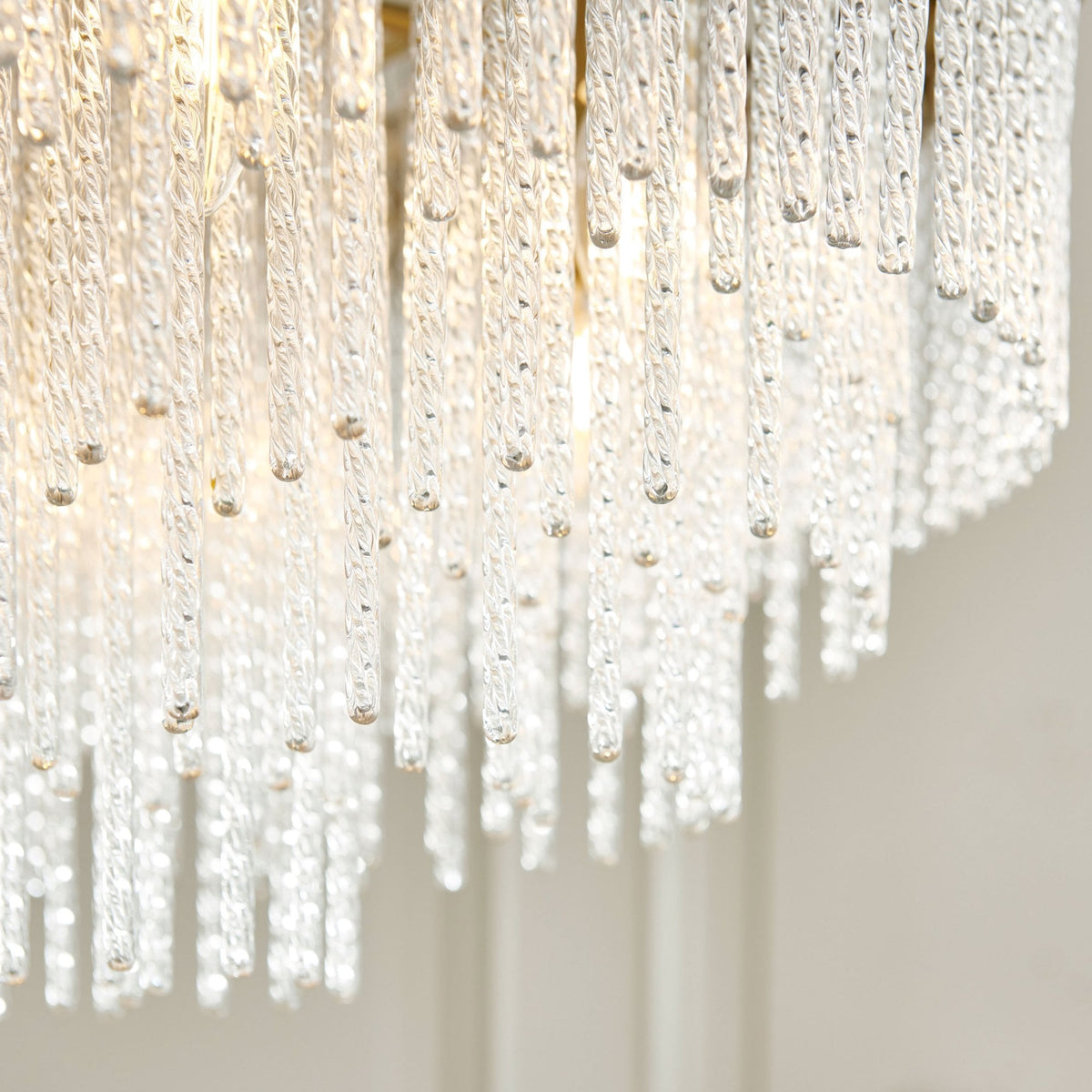 Anistoria Grand Nine Light Pendant in Brushed Aged Brass & Twisted Clear Decorative Glass Rods