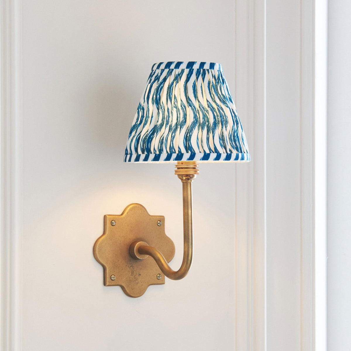 Anvil Swan Wall Light in Brass Patina with 16cm Ripple Marlin Blue Faux Linen Fabric Shade