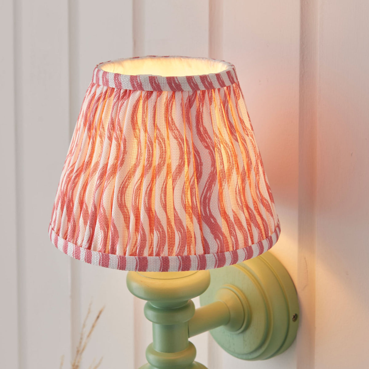 Carnaby Wall Light in Satin Cotswold Green Painted Finish with Ripple 20cm Coral Pink Faux Linen Fabric Shade
