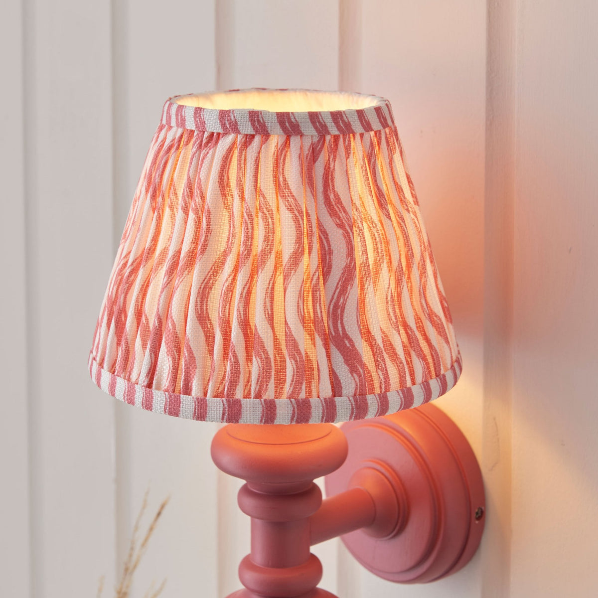Carnaby Wall Light in Satin Pink Clay Painted Finish with Ripple 20cm Coral Pink Faux Linen Fabric Shade