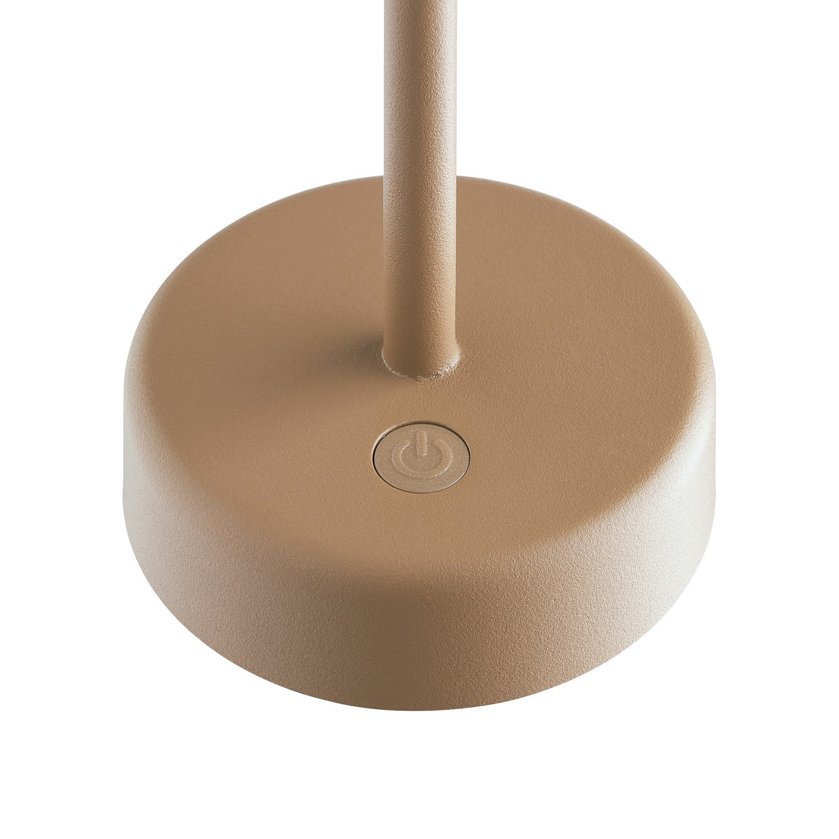 Close up of the base of a beige lamp with a power button