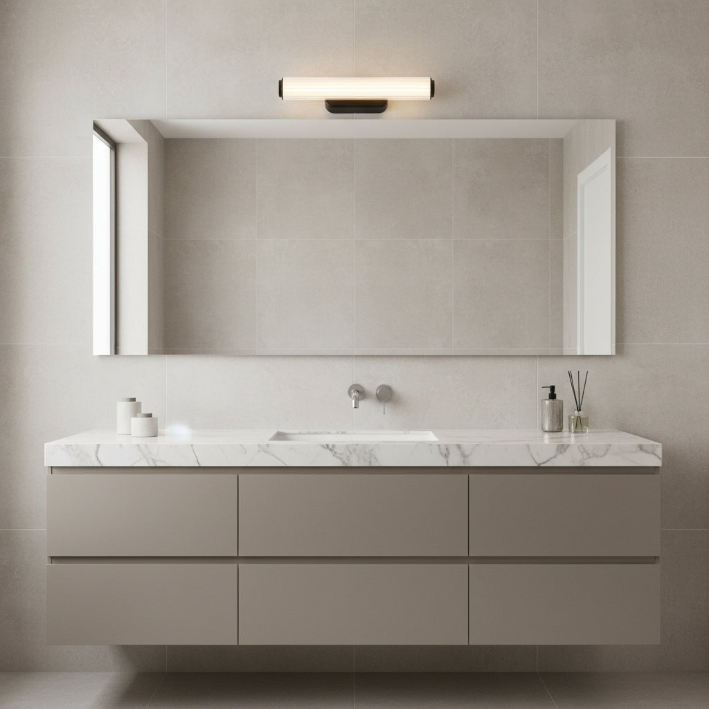 Bathroom vanity with a marble countertop, a large mirror, and a modern light fixture