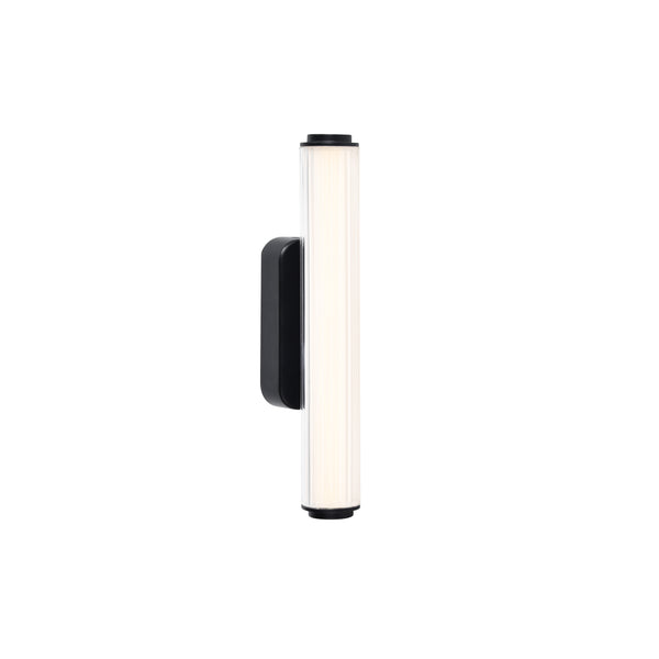 Black and white vertical wall sconce with a ribbed glass shade