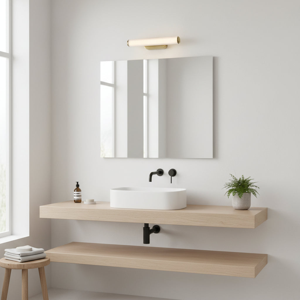 Modern bathroom with a white oval sink, black faucet, and a light wood floating vanity
