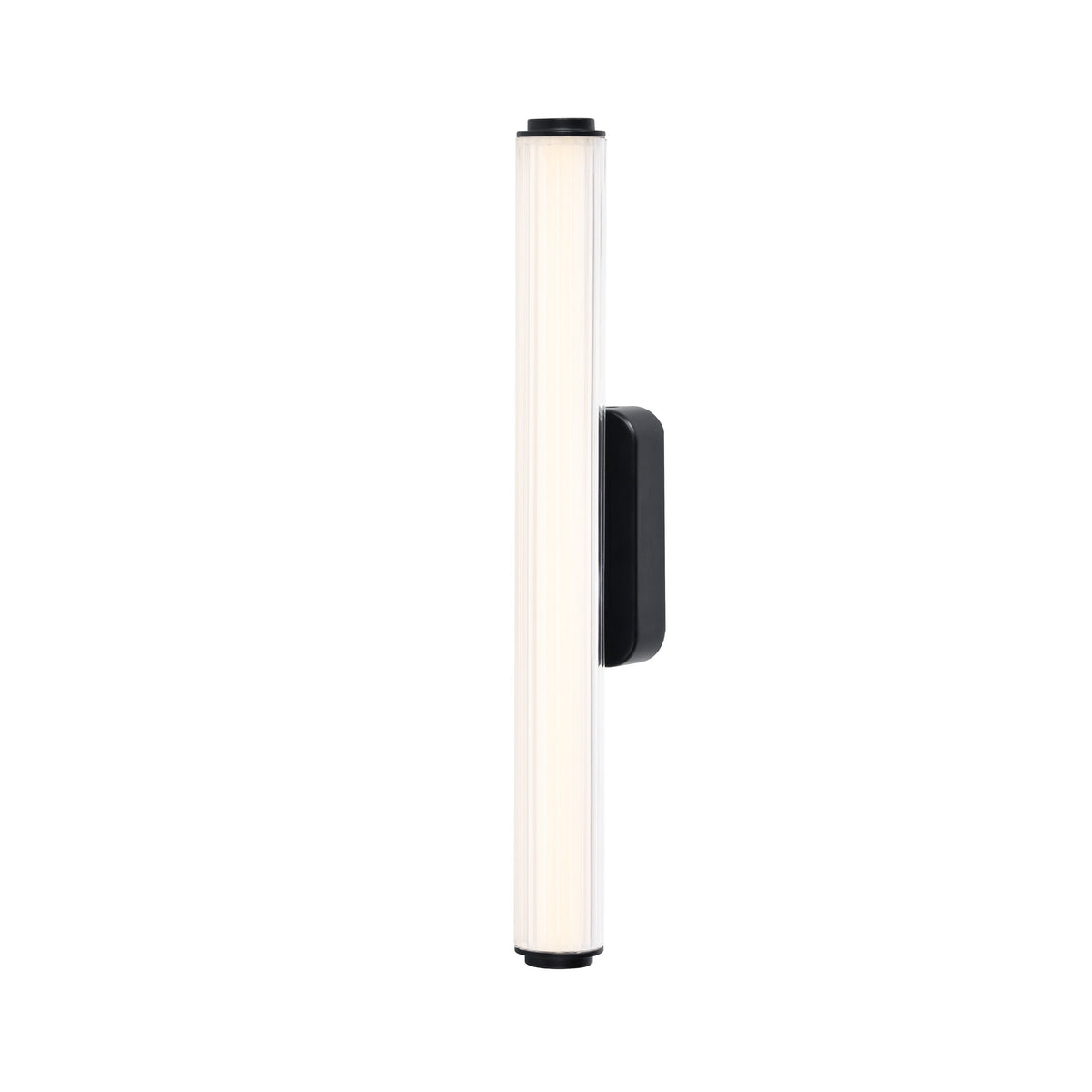 Vertical ribbed glass wall sconce with black metal base and top, emitting a warm glow