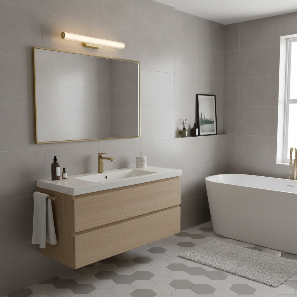 Bathroom with light gray wall tiles, a floating wooden vanity, a white bathtub, and hexagonal floor tiles