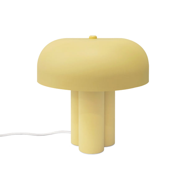 Yellow mushroom-shaped table lamp with a domed shade and three cylindrical legs
