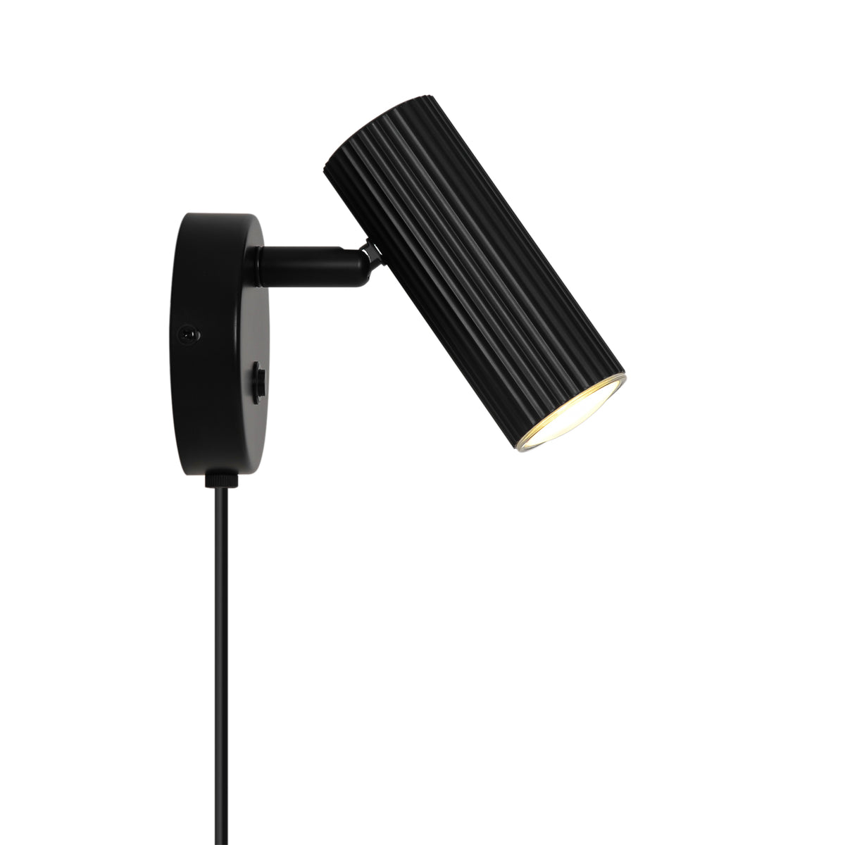 Black fluted wall lamp with an adjustable head and a visible light source
