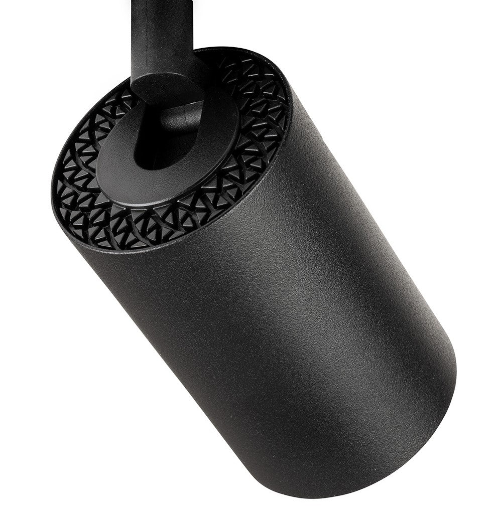 Black cylindrical track light with a textured top surface