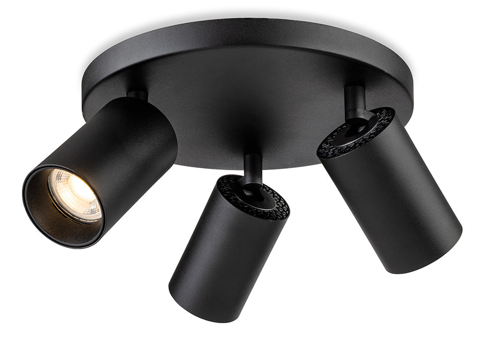 Black ceiling light with three adjustable spotlights, one illuminated