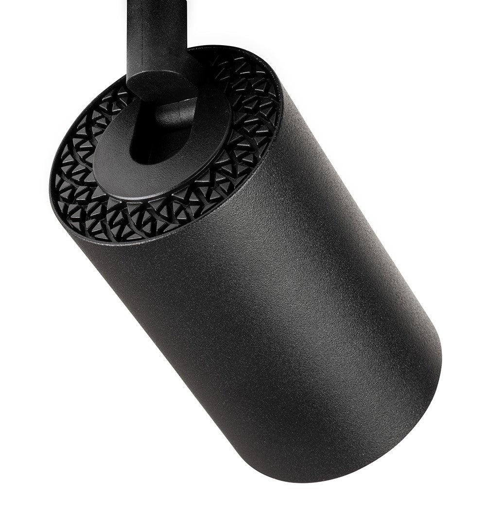 Black cylindrical track light with a textured, patterned top