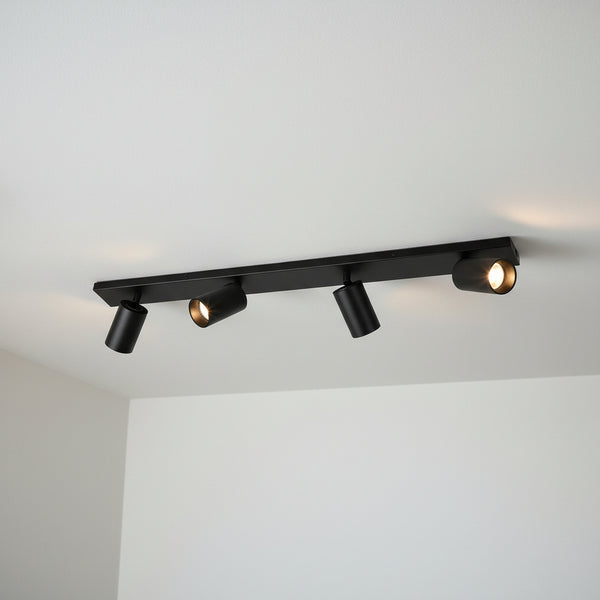 Black ceiling track light with four adjustable spotlights