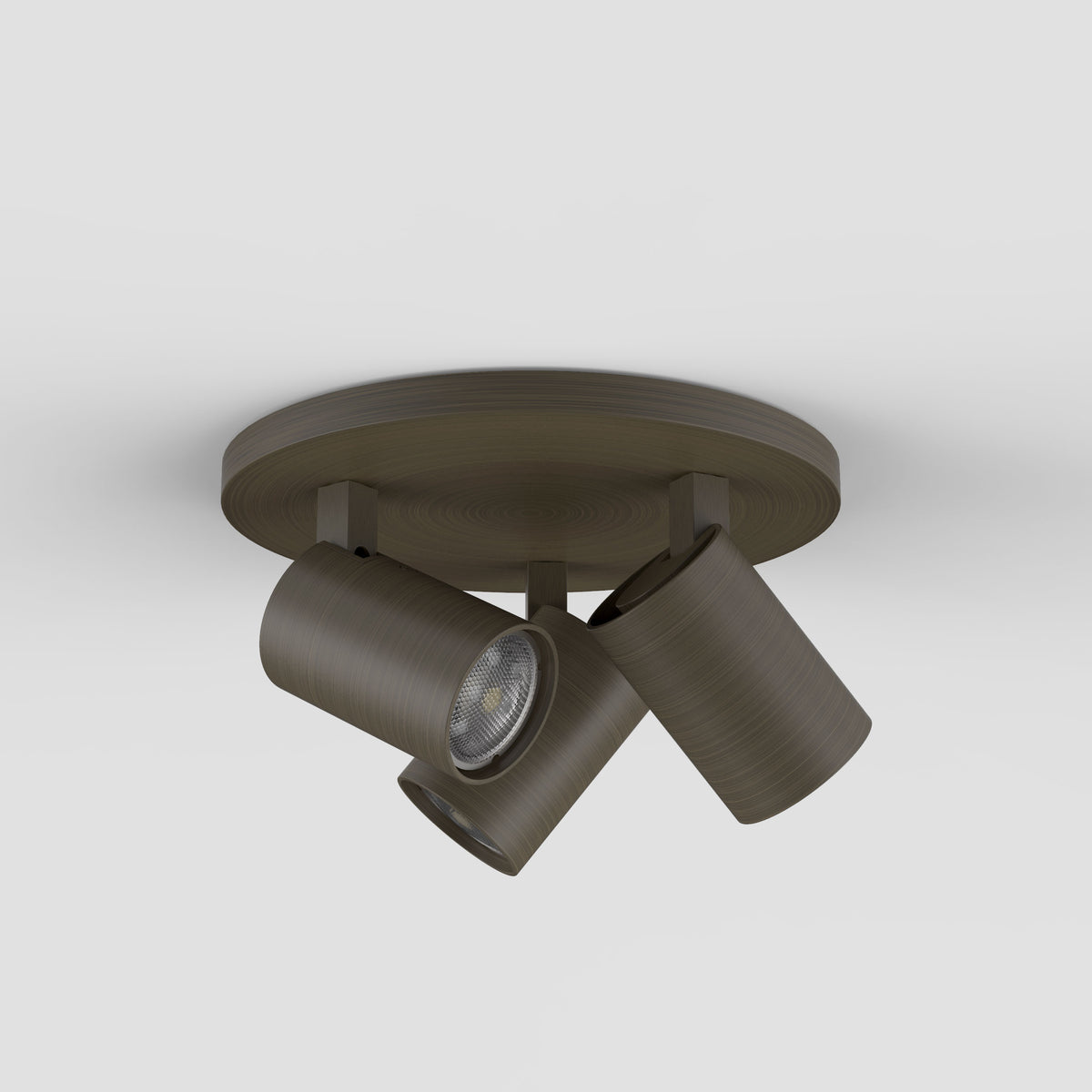 Three-light ceiling spotlight in a dark bronze finish, with adjustable cylindrical heads and exposed bulbs