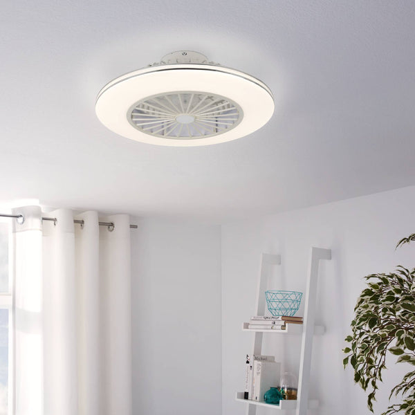 White ceiling fan with light in a modern room with white curtains and a white ladder shelf