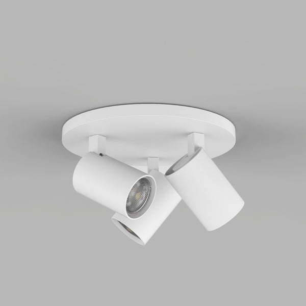 White ceiling light fixture with three adjustable cylindrical spotlights