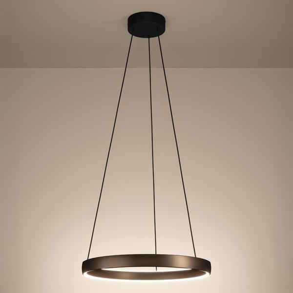 Modern black circular pendant light with an illuminated inner ring, hanging from a ceiling.