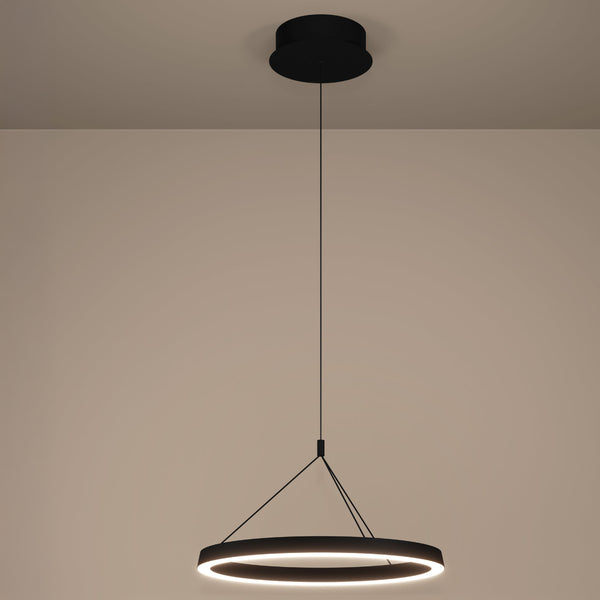 Modern black circular pendant light with a glowing white inner ring, suspended from the ceiling.