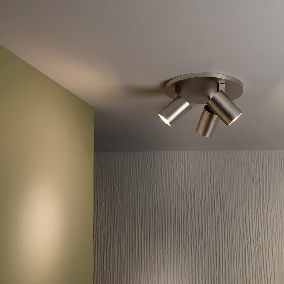 Three spot lights on a ceiling