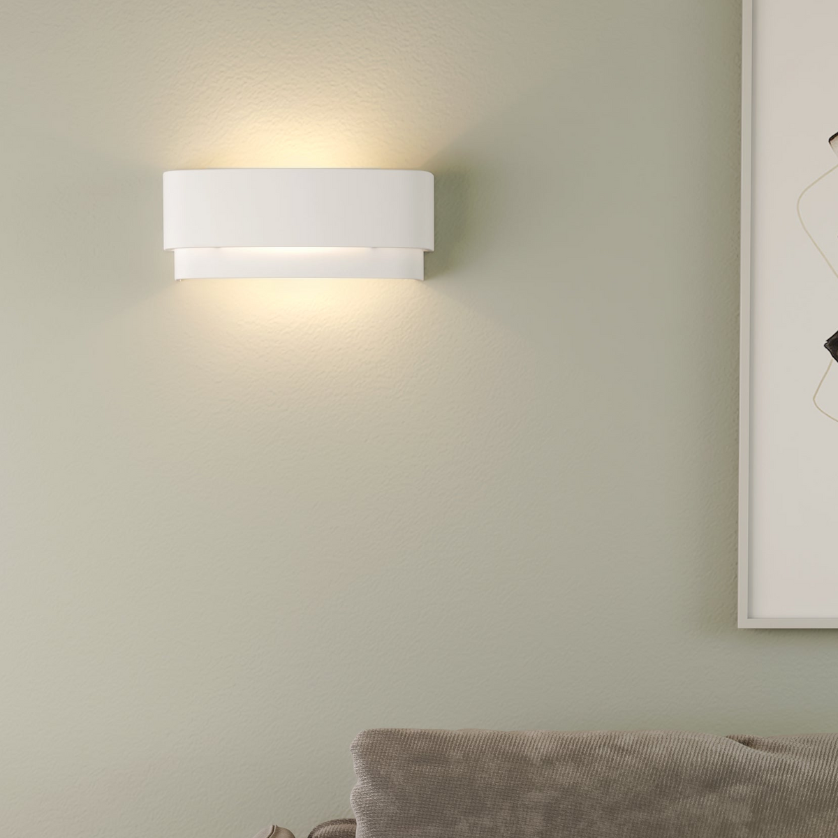 White wall light with two horizontal layers, casting light upwards and downwards on a light green wall