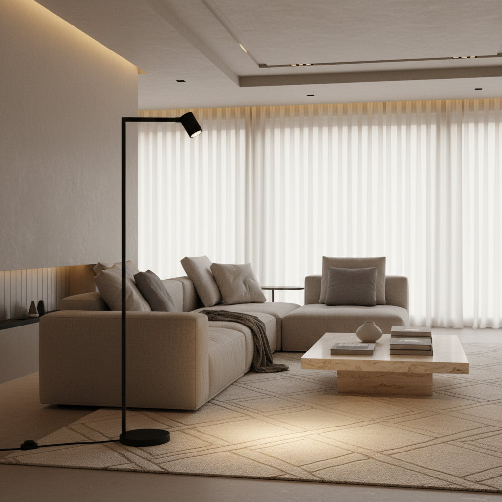 Modern living room with a beige sectional sofa, marble coffee table, and a black floor lamp