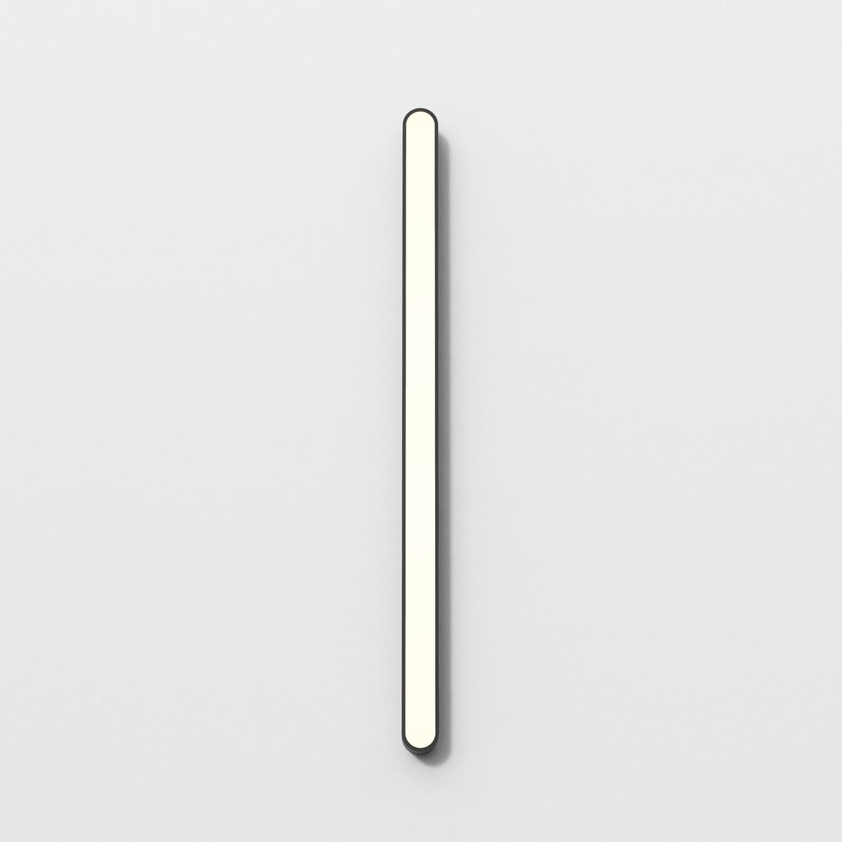 Vertical wall light with rounded ends