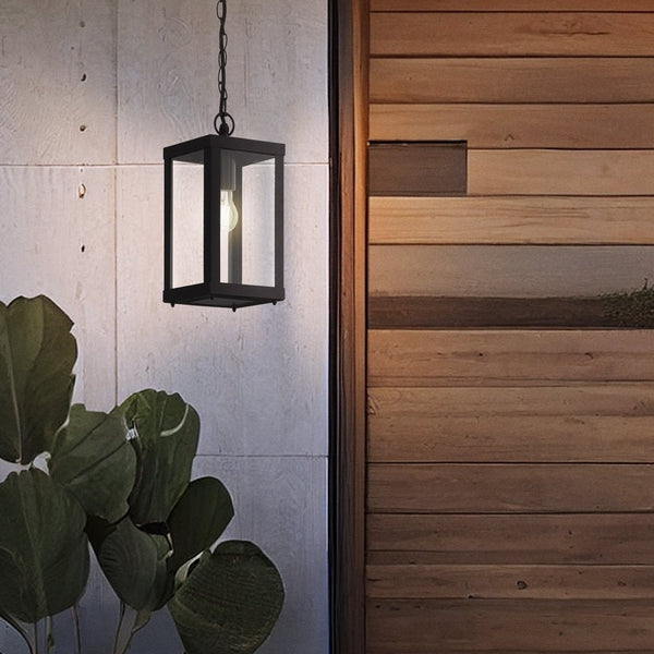 Black metal outdoor hanging lantern with clear glass panels and an exposed bulb