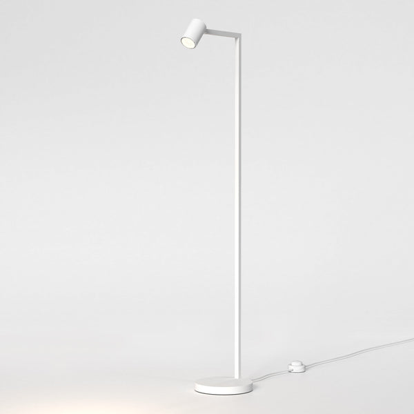 White floor lamp with a cylindrical head and a round base, casting light downwards