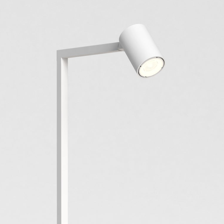 White cylindrical spotlight on a white stand