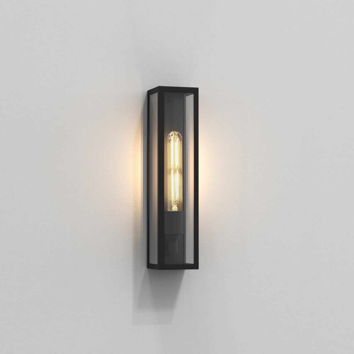 Black rectangular wall light with a clear glass shade and an exposed filament bulb