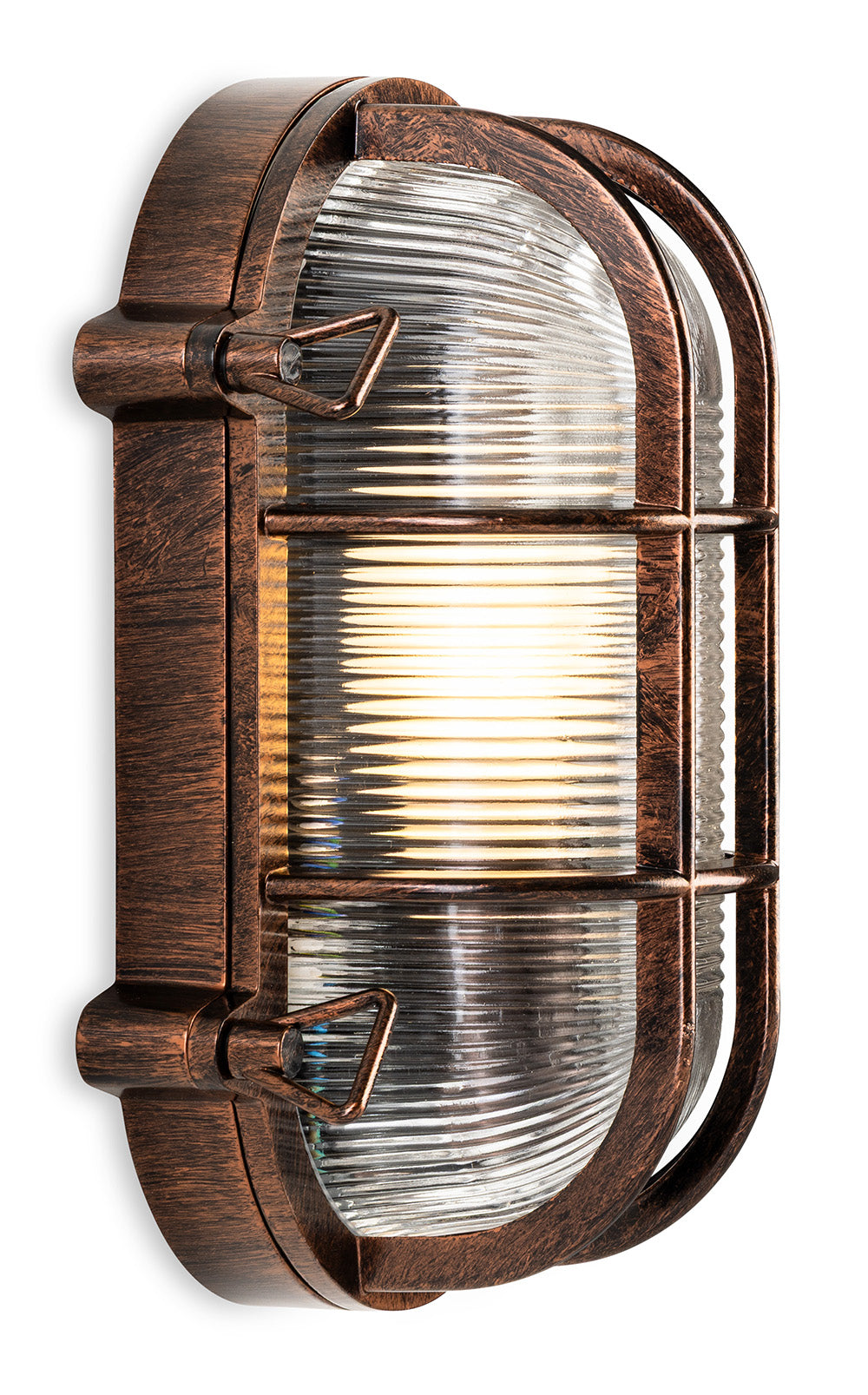 Oval bulkhead light in a copper finish with a ribbed glass diffuser