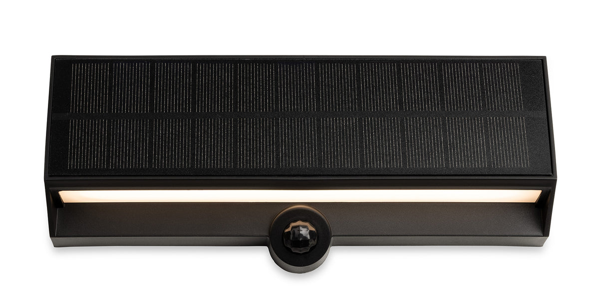 Black solar-powered outdoor light with a motion sensor and an illuminated LED strip