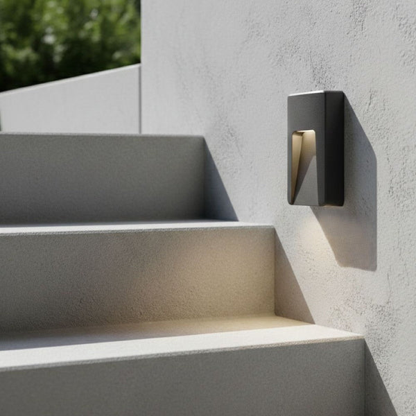 Outdoor wall light illuminating concrete steps