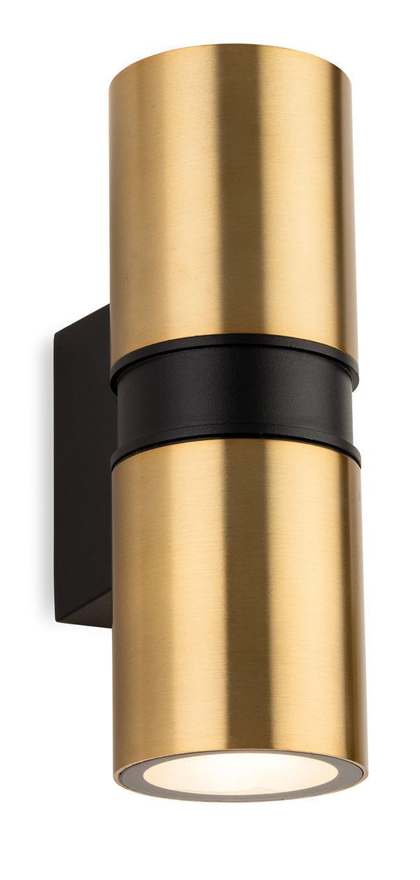 Cylindrical brass wall light with a black band around the middle and a black mounting plate