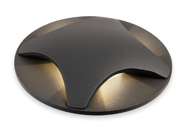 Round black outdoor ground light with three light beams