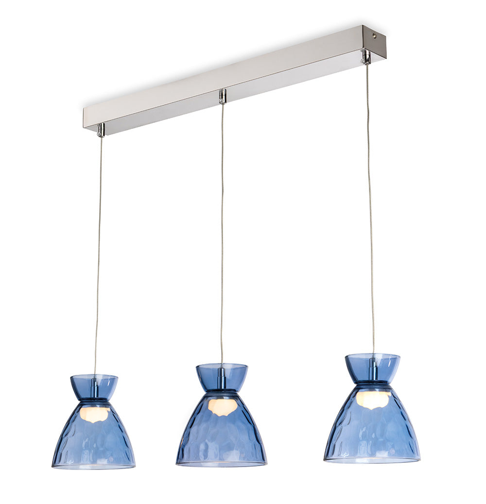 Three blue glass pendant lights hang from a silver bar