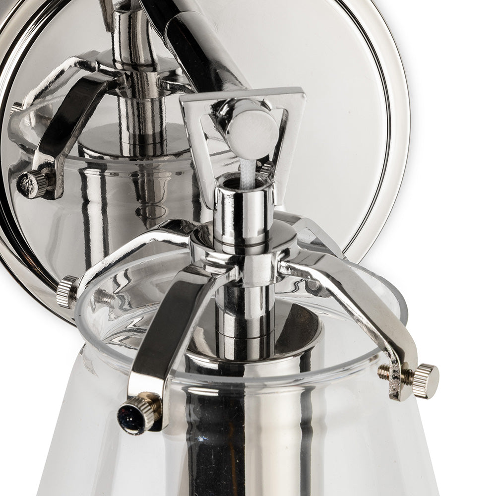 Polished nickel wall light with clear glass shade