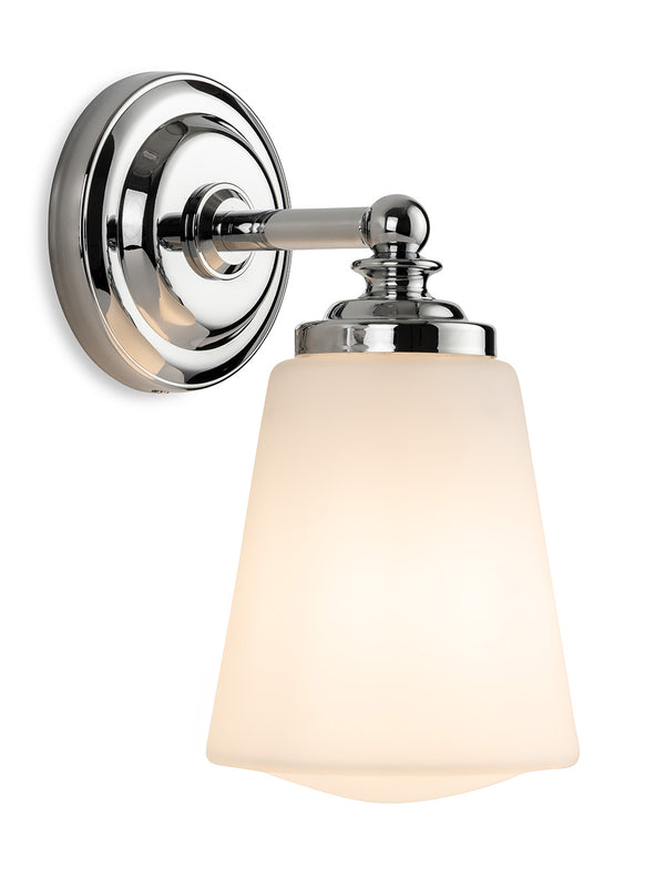 Chrome wall sconce with a frosted glass shade