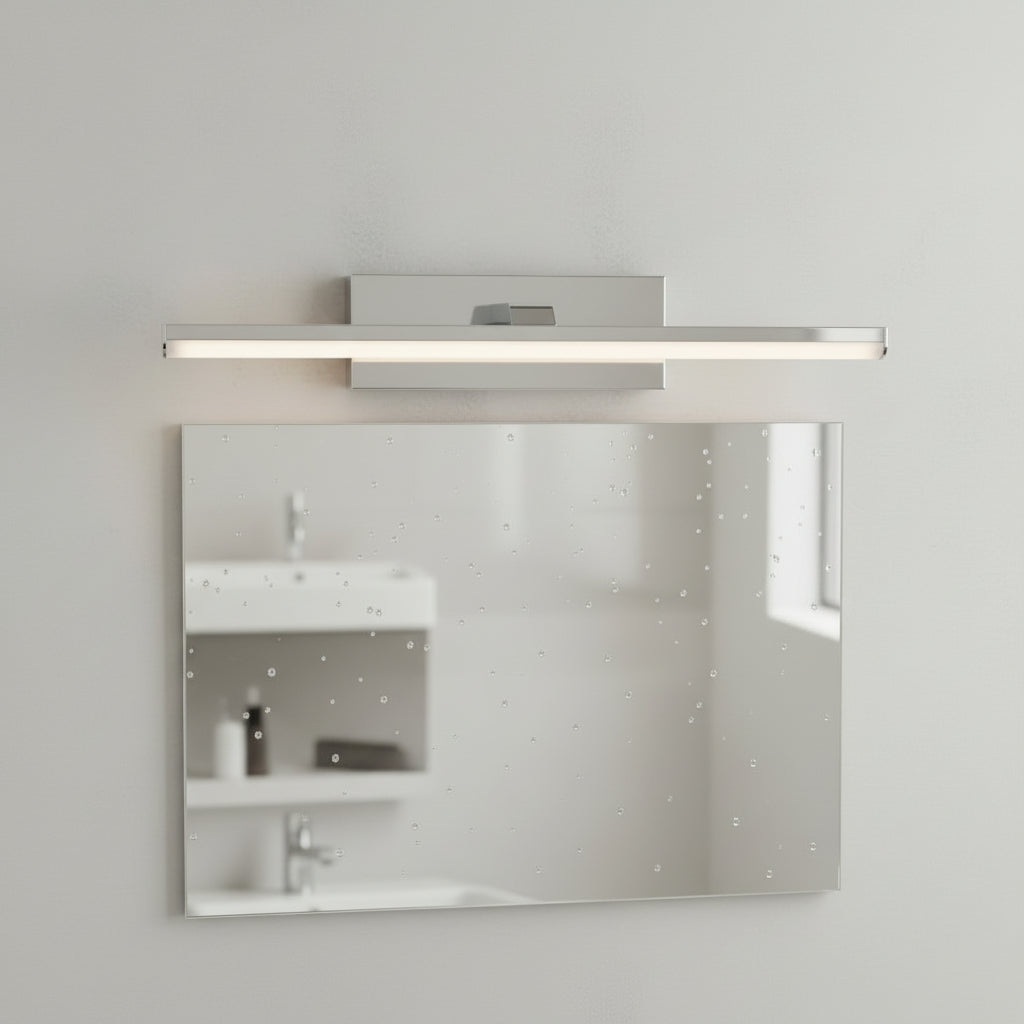 Rectangular mirror with water droplets and a horizontal light fixture above it