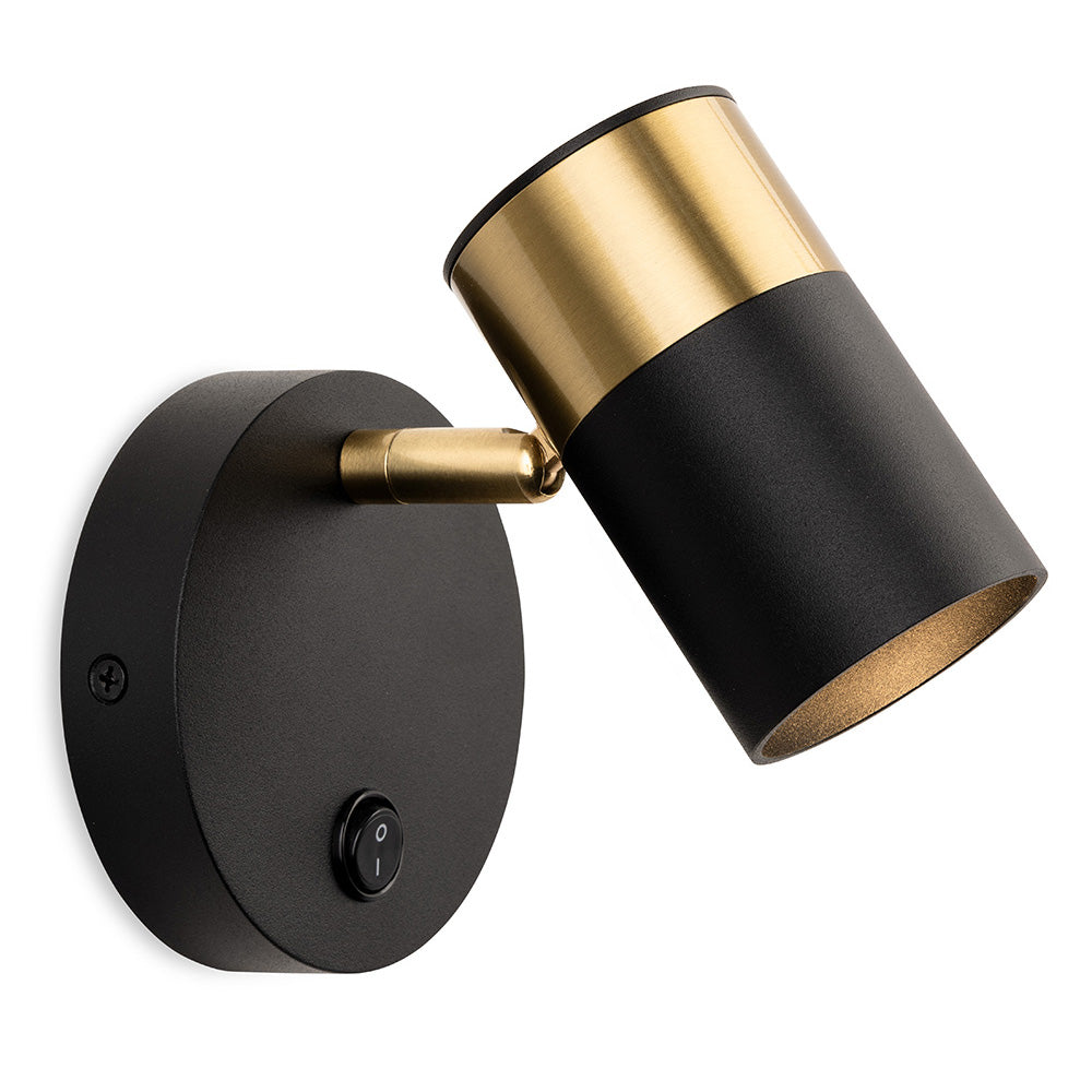 Black and gold wall light with an adjustable cylindrical head and a circular base with a switch