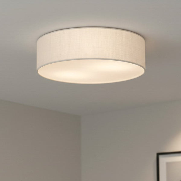 Round ceiling light with a white fabric shade
