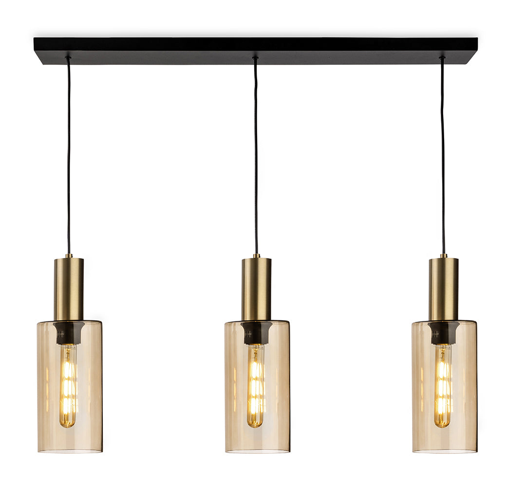 Three pendant lights with amber glass shades and brass accents hanging from a black rectangular bar