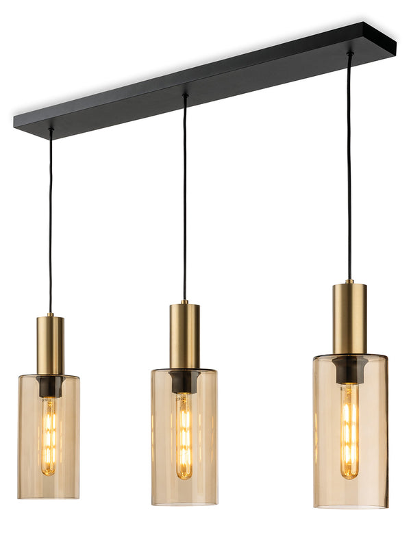 Three pendant lights with amber glass shades and brass accents hanging from a black bar