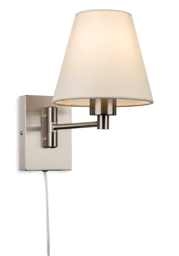 Brushed nickel wall sconce with a white tapered fabric shade