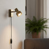 Evara Plug In Switched Wall Light in Antique Brass